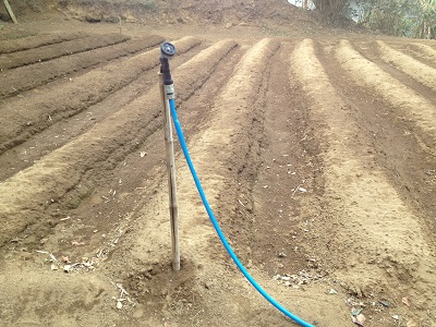Bamboo farm hose nozzle holder